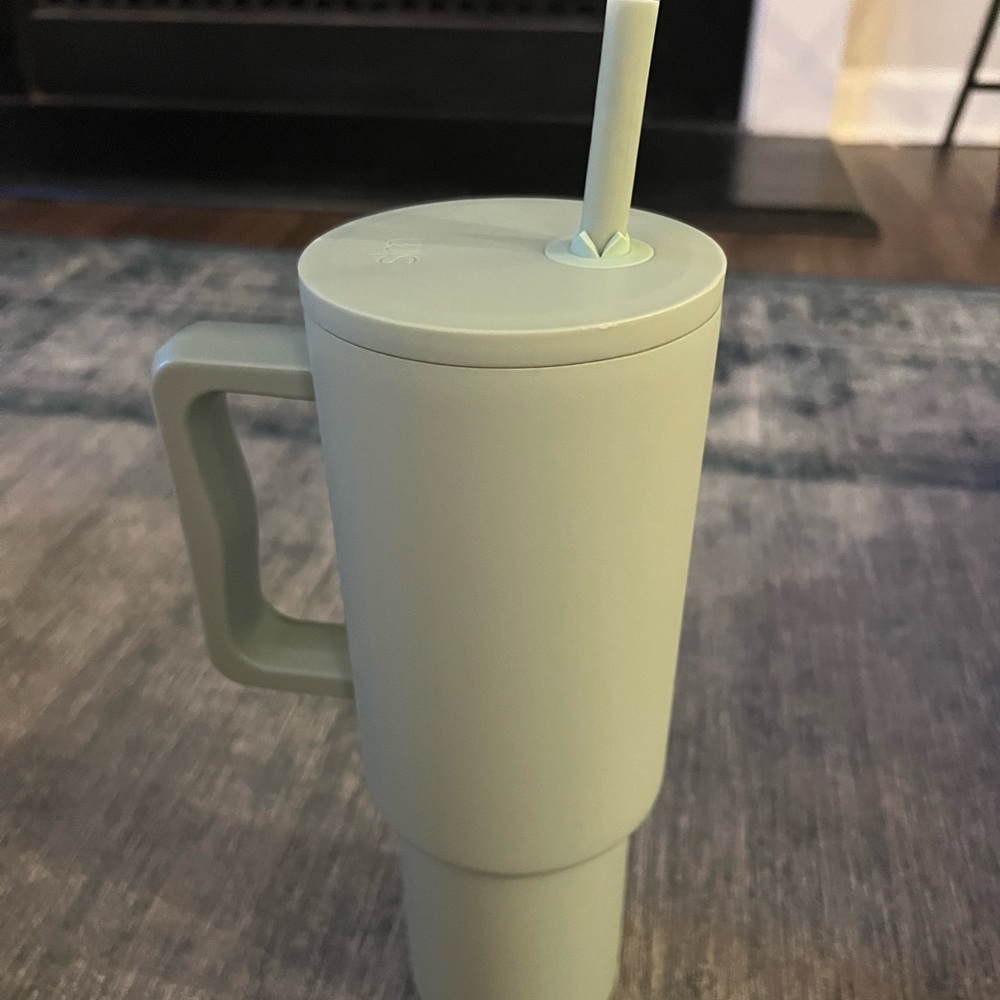 Simple modern tumbler in light green. Unused. See pic for scuff marks